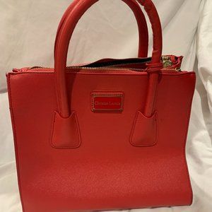 Red crossbody bag by Christian Lacroix